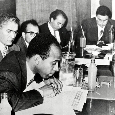 Frantz Fanon At A Press Conference During A Writers' Conference In Tunis, 1959, Wikimedia Commons